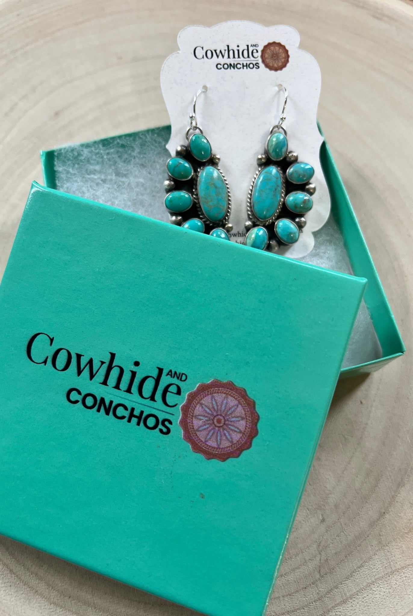Kathleen Livingston Navajo Sterling Silver Earrings with Sonoran Gem Turquoise — 2" × 3/4" (Hallmarked) - Cowhide and Conchos