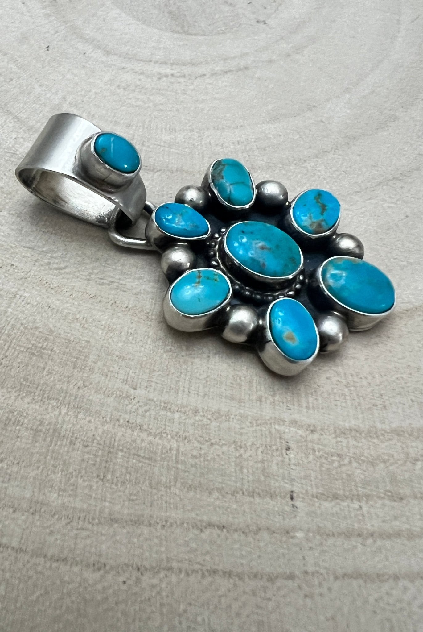 Kathleen Livingston Navajo Sterling Silver Pendant with Sonoran Gem Turquoise — 1 3/4" × 7/8" (Hallmark) - Cowhide and Conchos