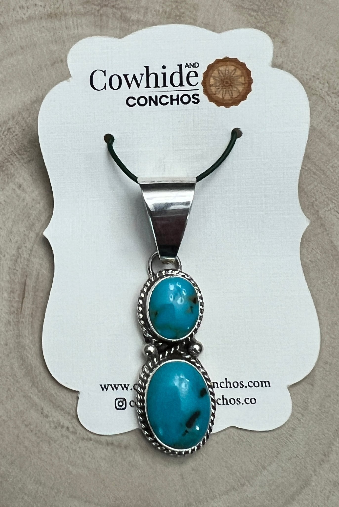 Kathleen Livingston Navajo Sterling Silver Pendant with Sonoran Gem Turquoise — 2" × 1/2" (Hallmarked) - Cowhide and Conchos