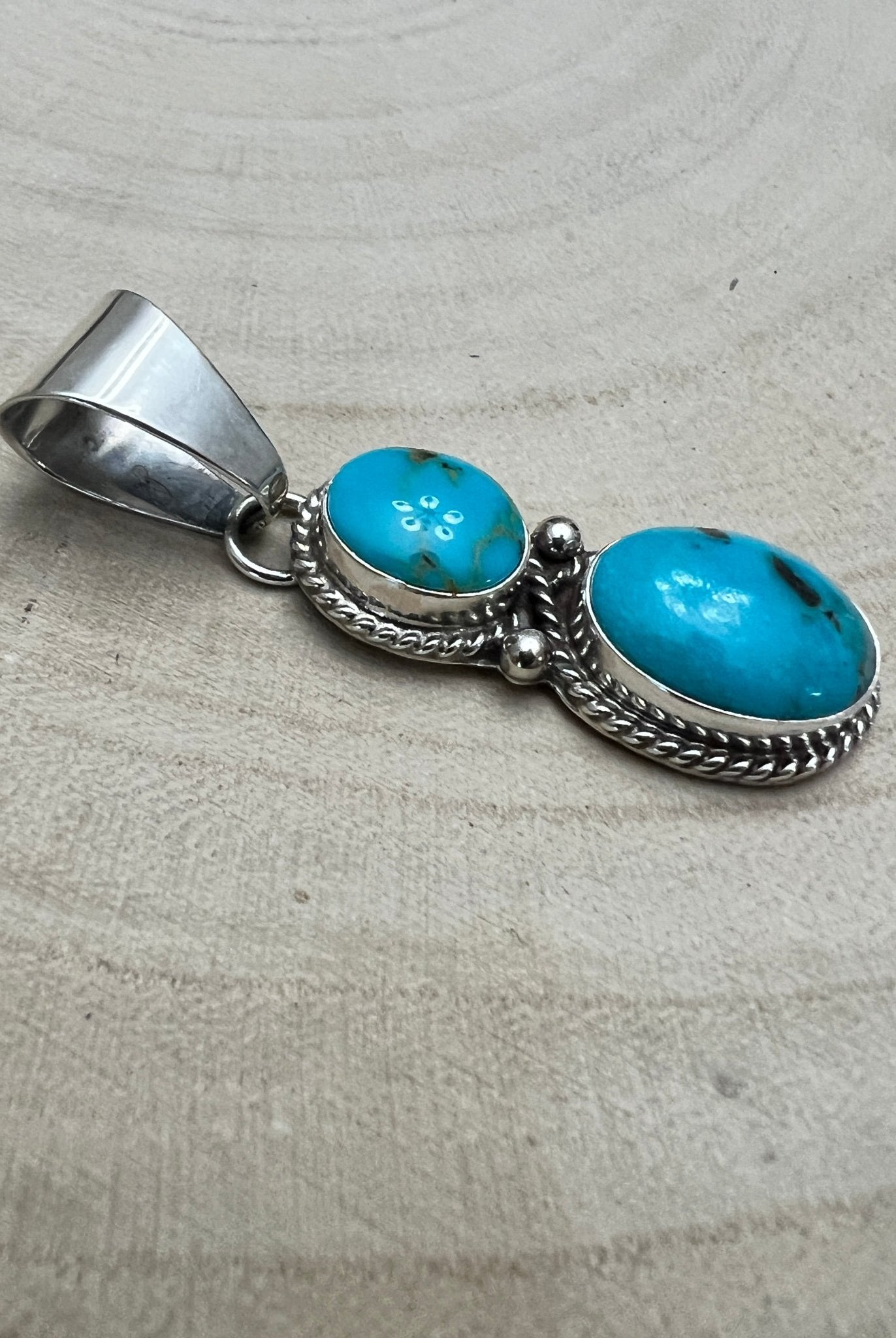 Kathleen Livingston Navajo Sterling Silver Pendant with Sonoran Gem Turquoise — 2" × 1/2" (Hallmarked) - Cowhide and Conchos