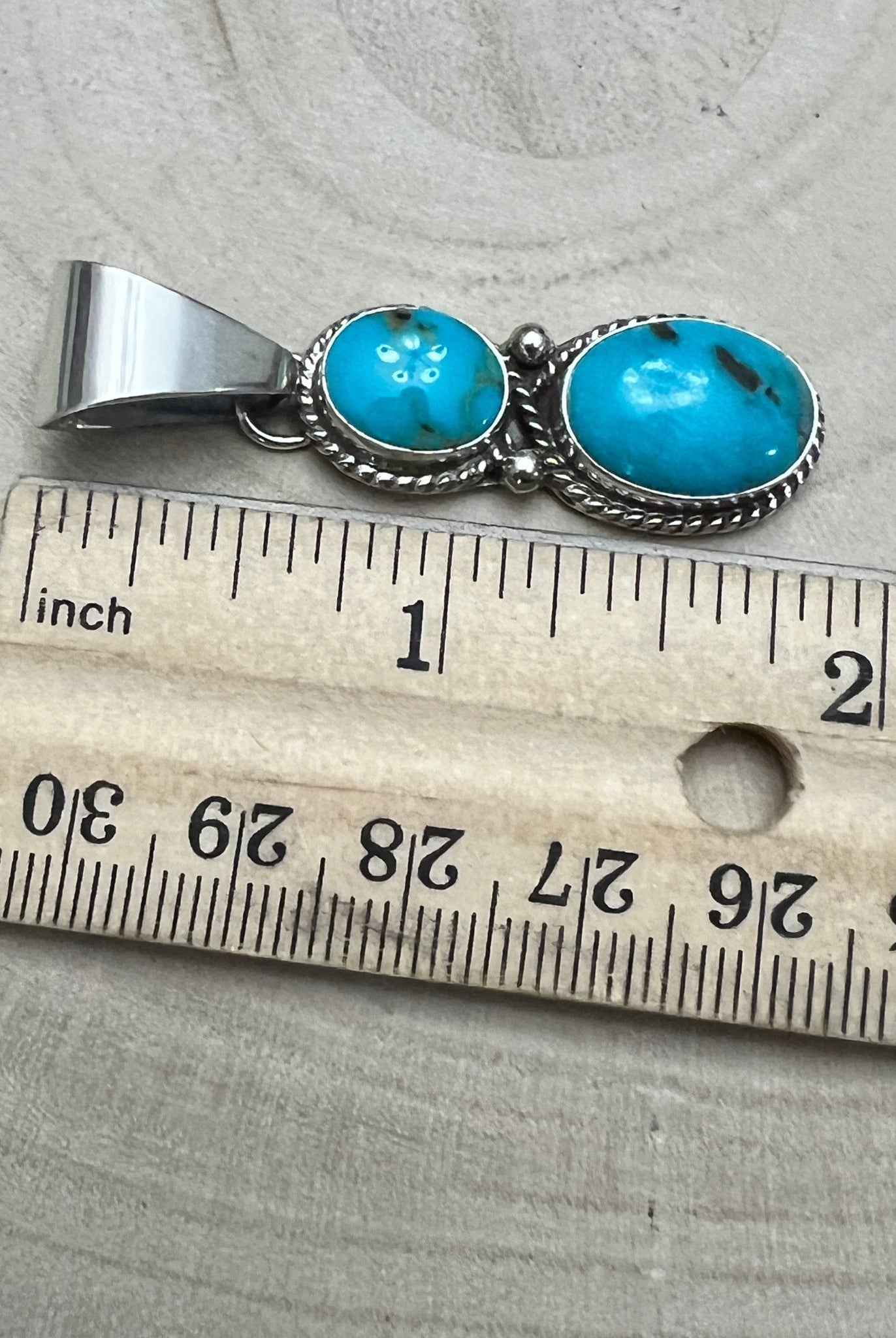 Kathleen Livingston Navajo Sterling Silver Pendant with Sonoran Gem Turquoise — 2" × 1/2" (Hallmarked) - Cowhide and Conchos