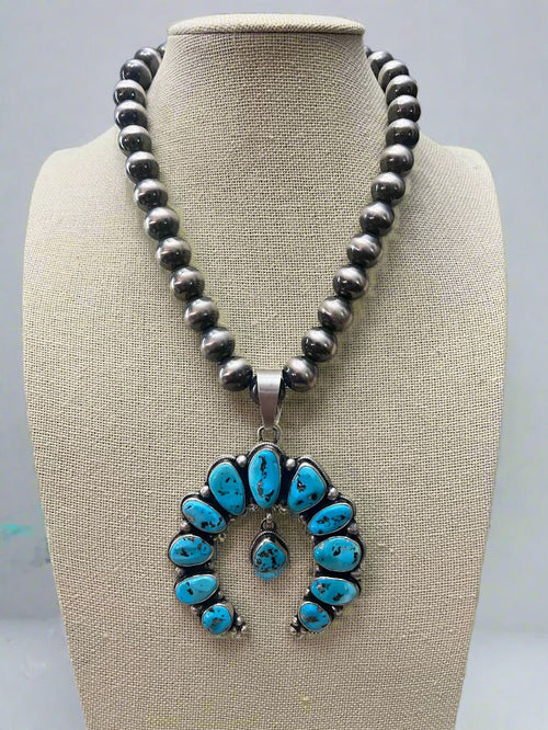 Kathleen Livingston Turquoise & Sterling Silver Naja Pendant - Cowhide and Conchos