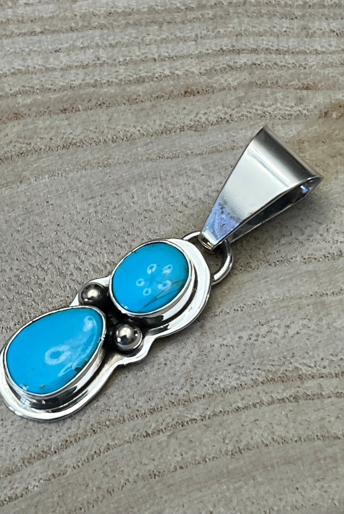 Kathleen Livingston Turquoise & Sterling Silver Pendant - Cowhide and Conchos