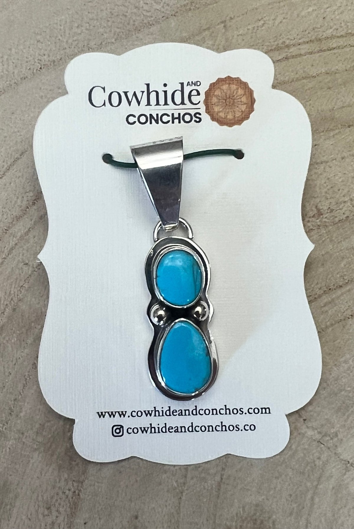 Kathleen Livingston Turquoise & Sterling Silver Pendant - Cowhide and Conchos