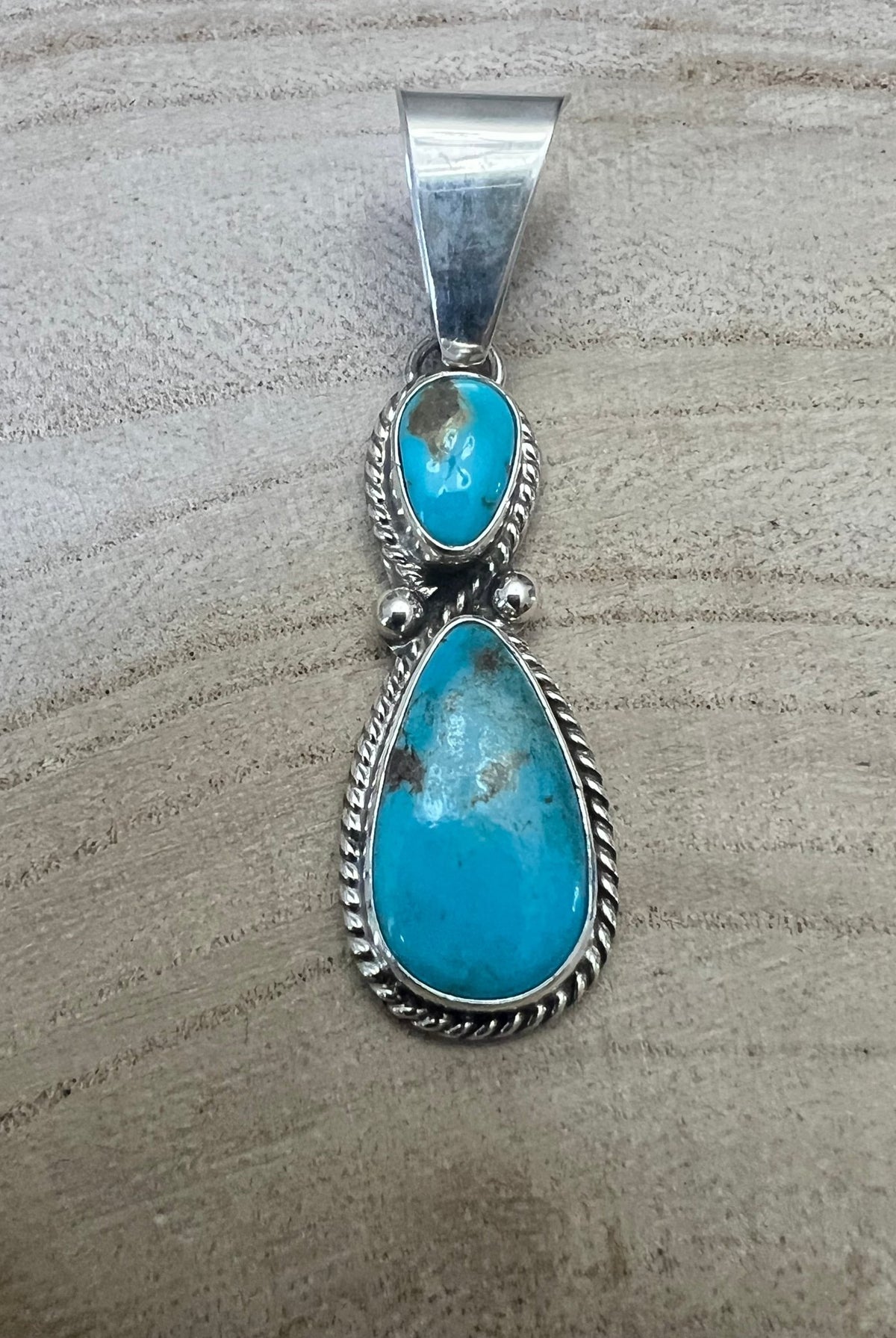 Kathleen Livingston Turquoise & Sterling Silver Pendant - Cowhide and Conchos