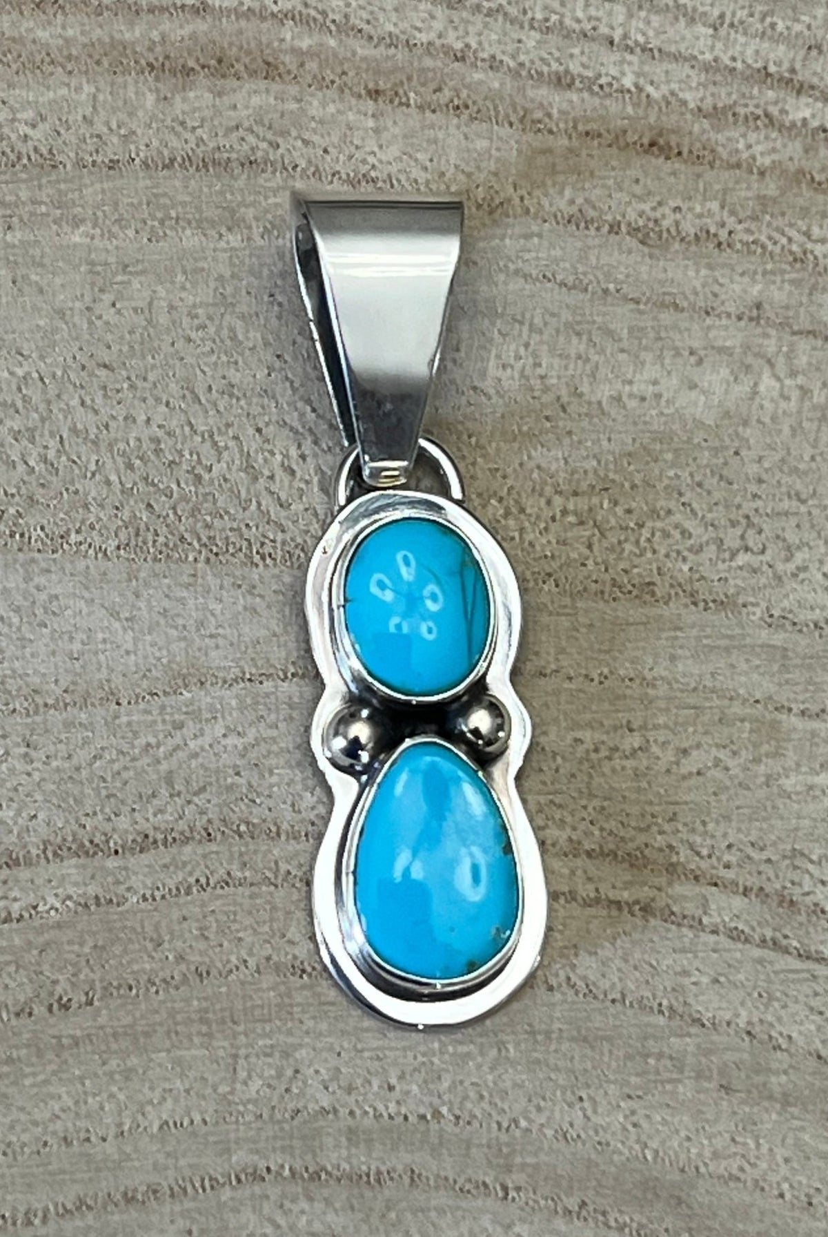 Kathleen Livingston Turquoise & Sterling Silver Pendant - Cowhide and Conchos
