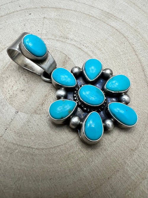 Kathleen Livingston Turquoise & Sterling Silver Pendant - Cowhide and Conchos