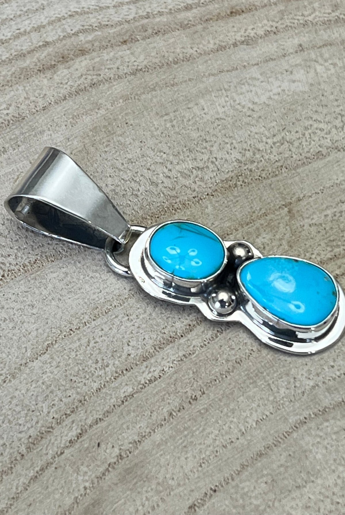 Kathleen Livingston Turquoise & Sterling Silver Pendant - Cowhide and Conchos