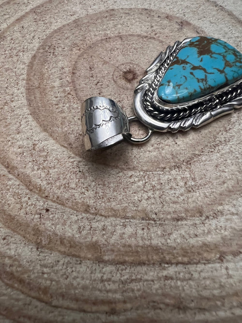 Kings Manassa Turquoise Pendant by Mike Thomas - Cowhide and Conchos