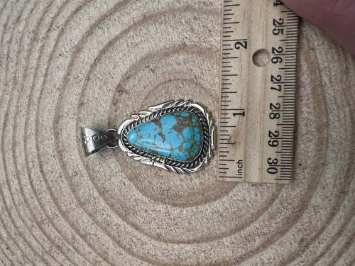 Kings Manassa Turquoise Pendant by Mike Thomas - Cowhide and Conchos