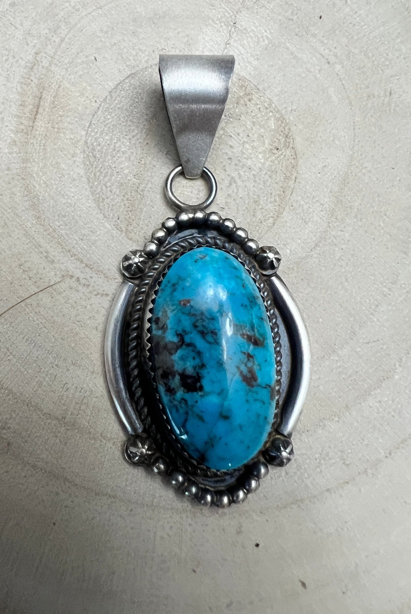 Leslie Nez Navajo Sterling Silver Pendant with Sonoran Rose Turquoise — 2 1/4" × 1" (Hallmarked, Heirloom) - Cowhide and Conchos
