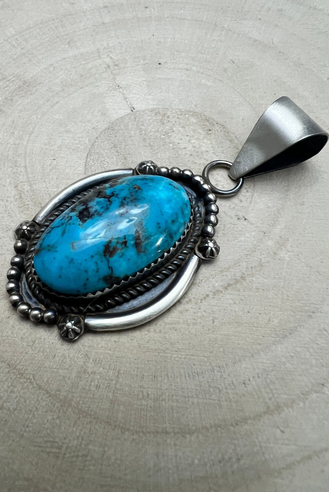 Leslie Nez Navajo Sterling Silver Pendant with Sonoran Rose Turquoise — 2 1/4" × 1" (Hallmarked, Heirloom) - Cowhide and Conchos