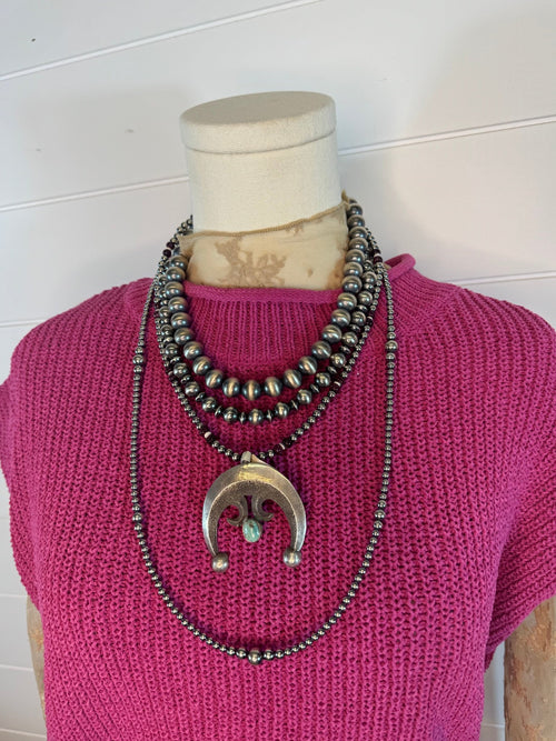 Naja with turquoise - Cowhide and Conchos