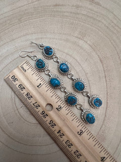 Navajo Handmade Kingman Turquoise Earrings by Donovan Nez - Cowhide and Conchos