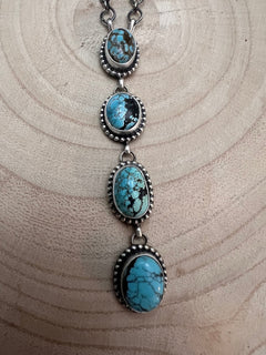 Navajo Handmade Kingman Turquoise Lariat Necklace by Lorenzo Juan - 20 inch - Cowhide and Conchos