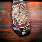 Painted hat feather by Chad Demien - Lion - Cowhide and Conchos