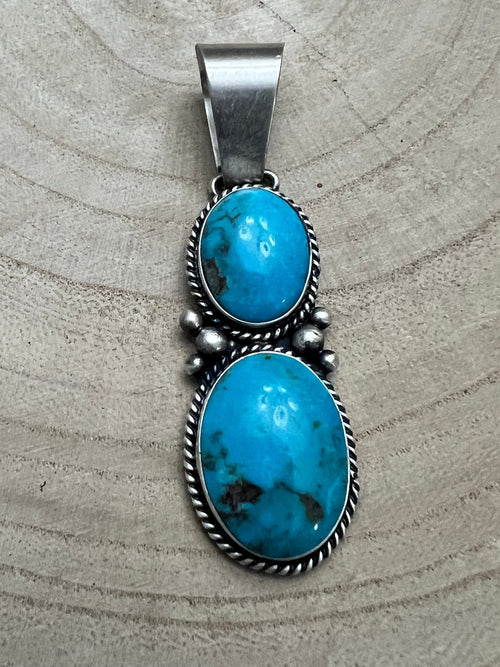 Paul Livingston Turquoise & Sterling Silver Pendant - Cowhide and Conchos