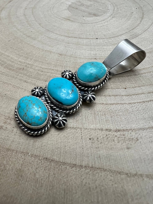 Paul Livingston Turquoise & Sterling Silver Pendant - Cowhide and Conchos
