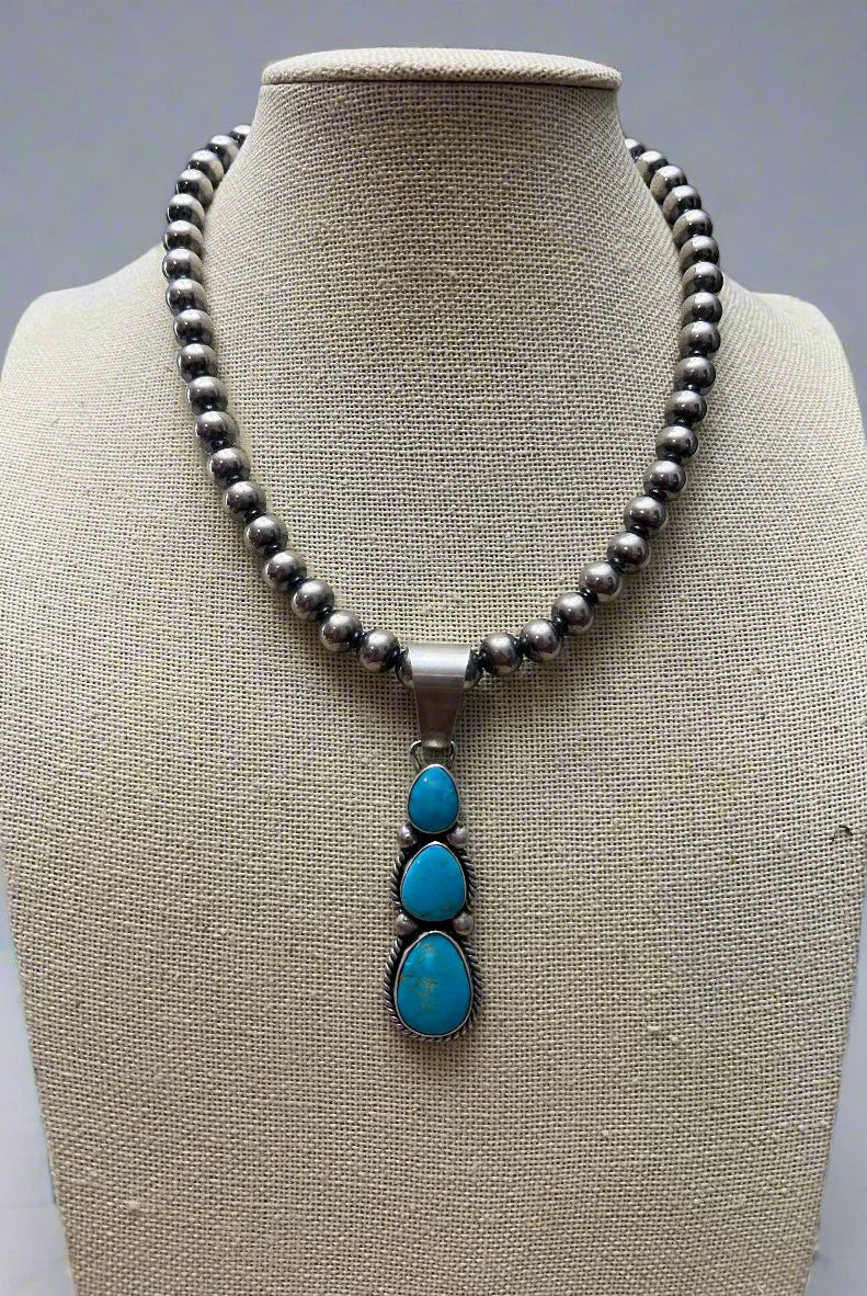 Paul Livingston Turquoise & Sterling Silver Pendant - Cowhide and Conchos