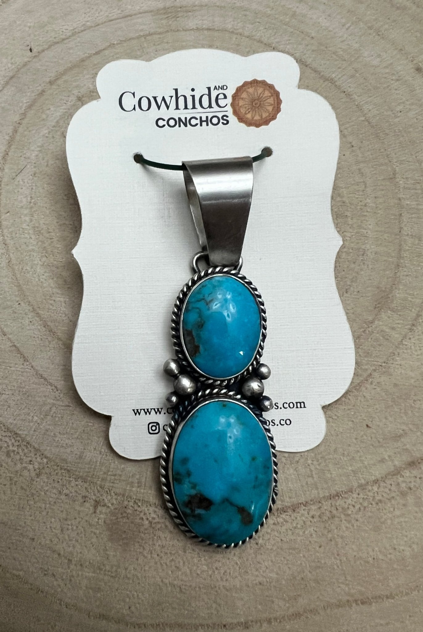 Paul Livingston Turquoise & Sterling Silver Pendant - Cowhide and Conchos