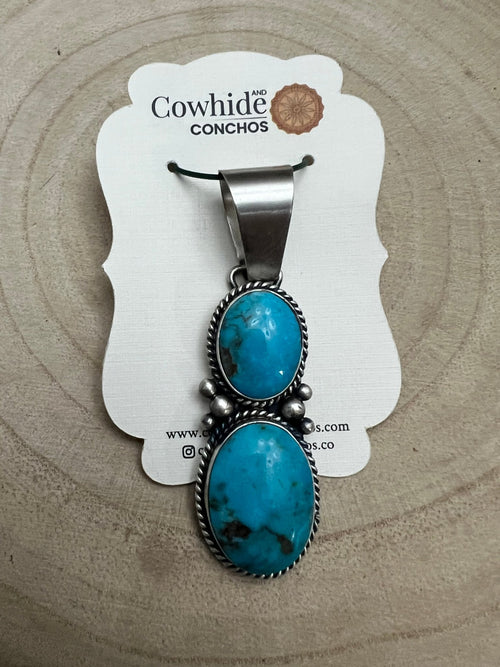 Paul Livingston Turquoise & Sterling Silver Pendant - Cowhide and Conchos