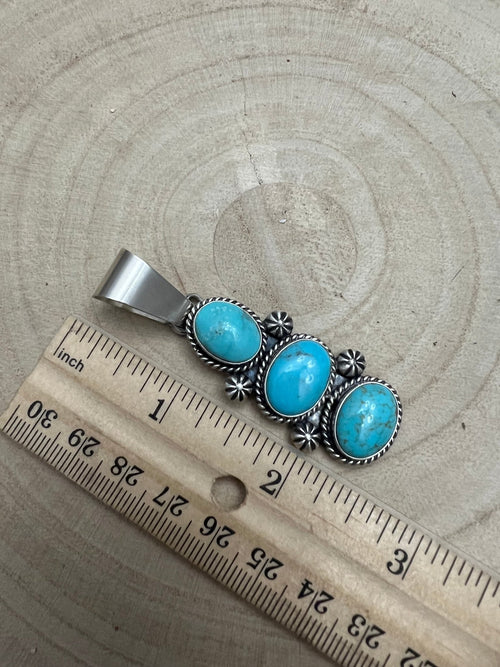 Paul Livingston Turquoise & Sterling Silver Pendant - Cowhide and Conchos