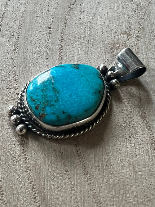 Rena Begay Turquoise & Sterling Silver Pendant - Cowhide and Conchos