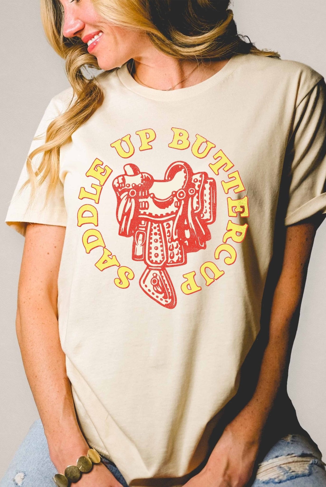 Saddle Up Buttercup T-Shirt - Cowhide and Conchos