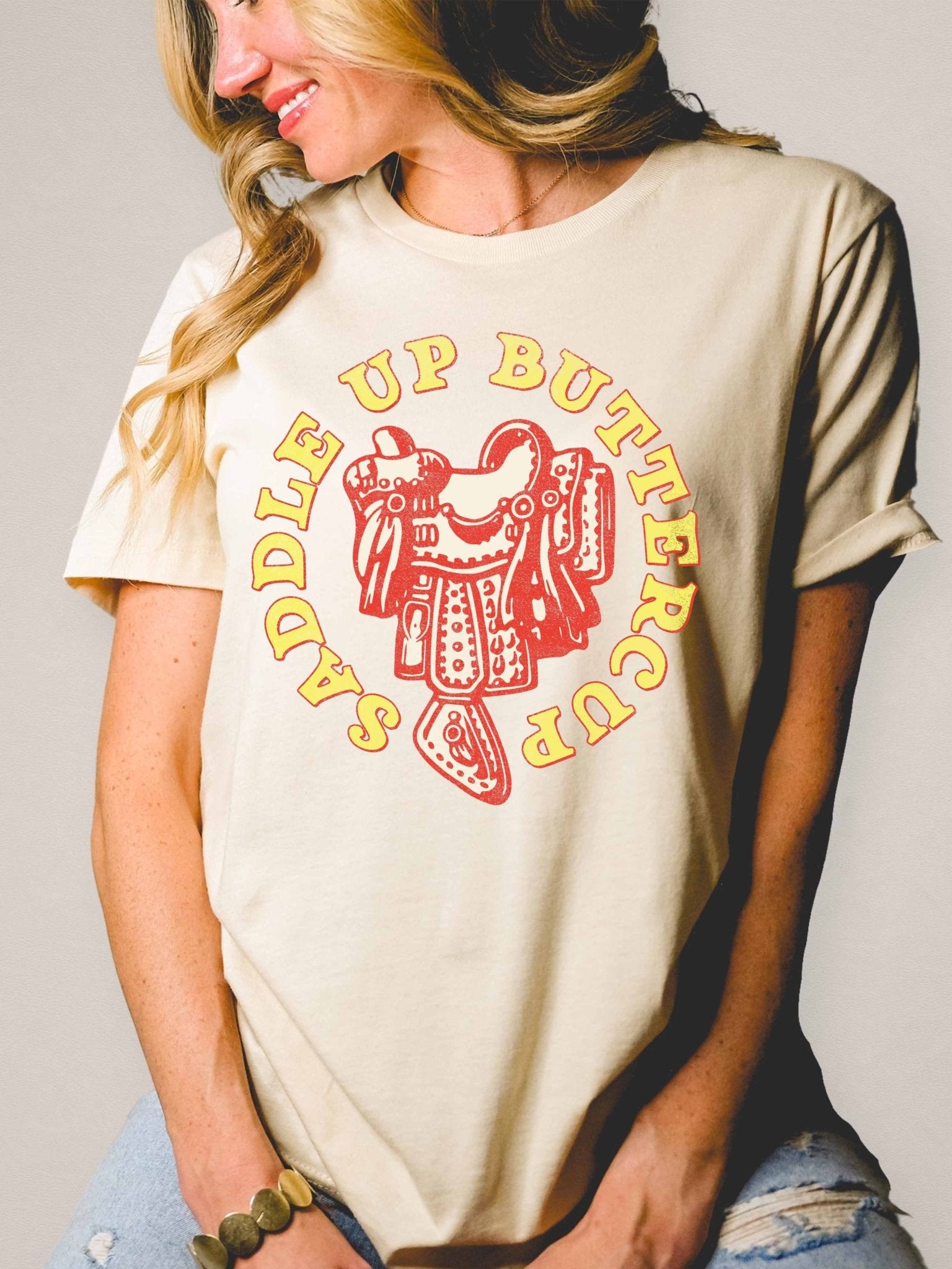 Saddle Up Buttercup T-Shirt - Cowhide and Conchos