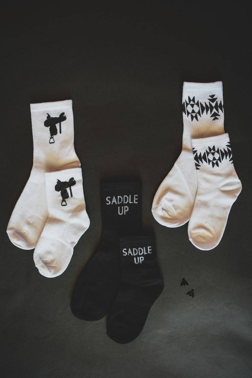 Sock 'em Silly - Saddle Mono - Cowhide and Conchos