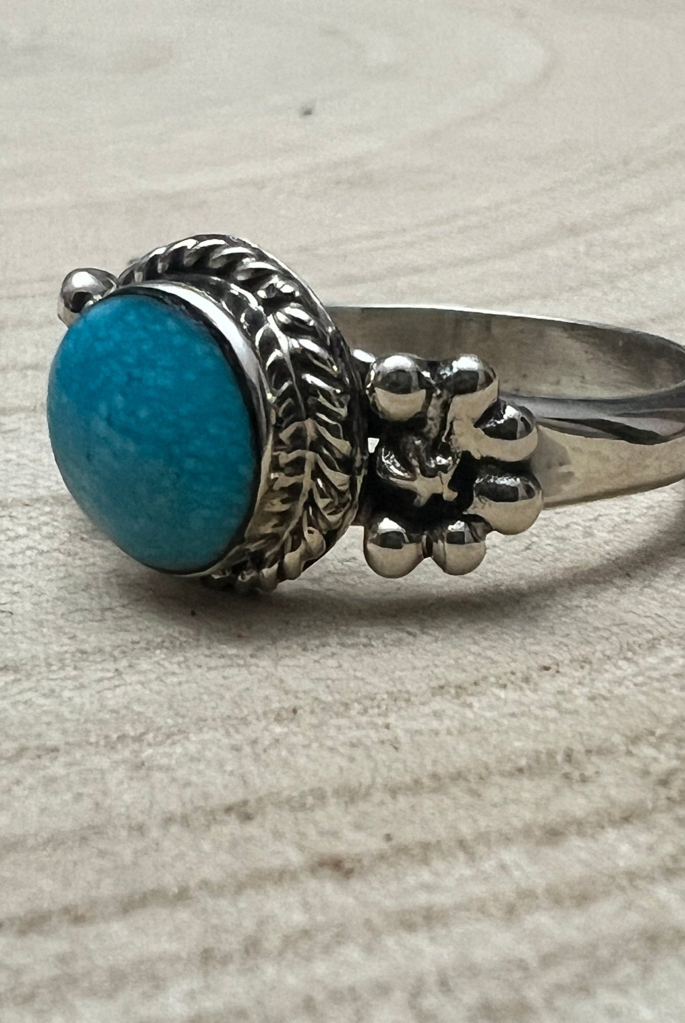 Suzanna Johnson Navajo Handmade Kingman Turquoise Ring - Cowhide and Conchos