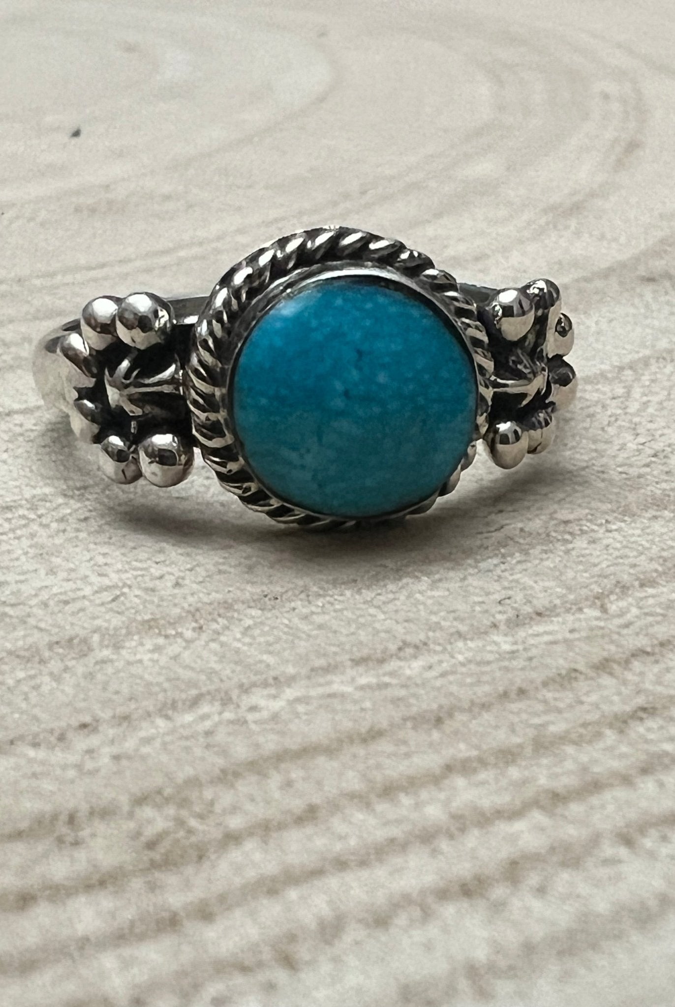 Suzanna Johnson Navajo Handmade Kingman Turquoise Ring - Cowhide and Conchos