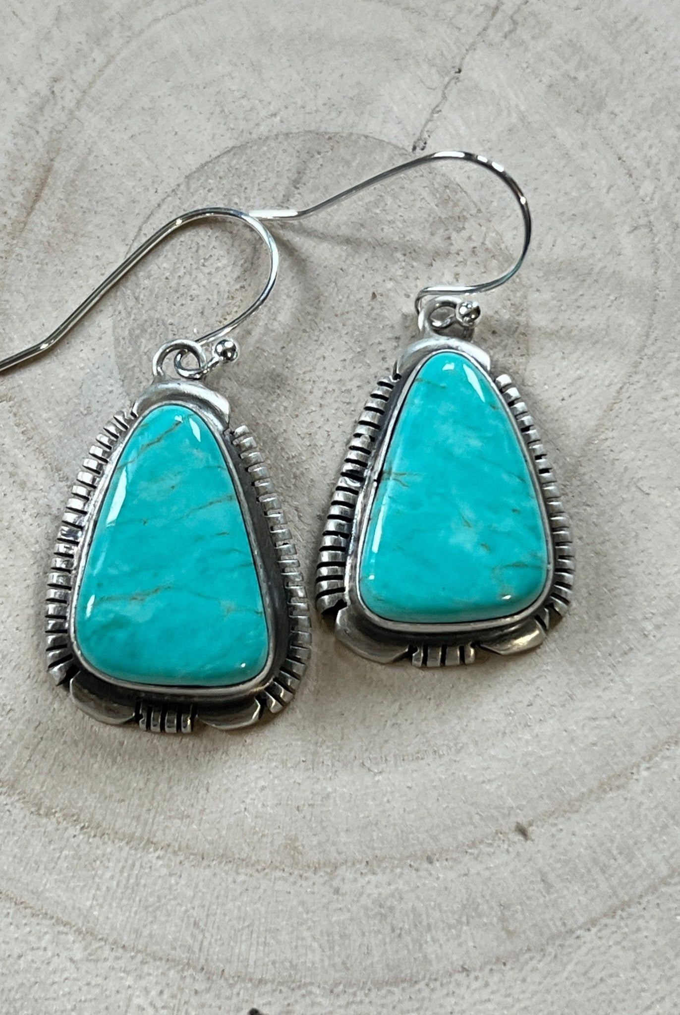 Thomas Francisco Navajo Sterling Silver Earrings with Tyrone Turquoise — 1 5/8" × 3/4" (Hallmarked) - Cowhide and Conchos