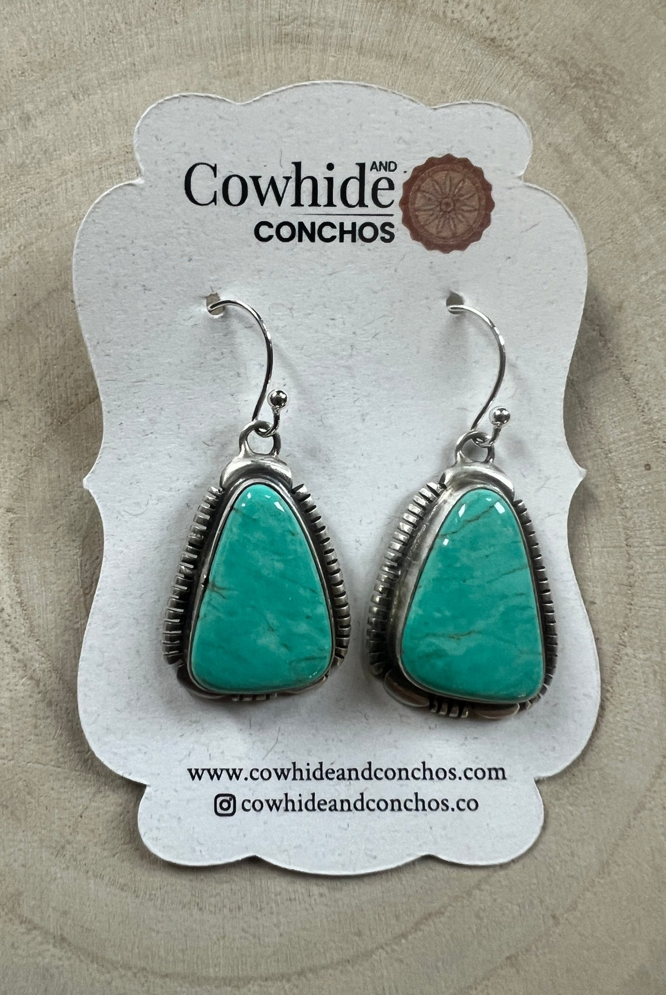 Thomas Francisco Navajo Sterling Silver Earrings with Tyrone Turquoise — 1 5/8" × 3/4" (Hallmarked) - Cowhide and Conchos