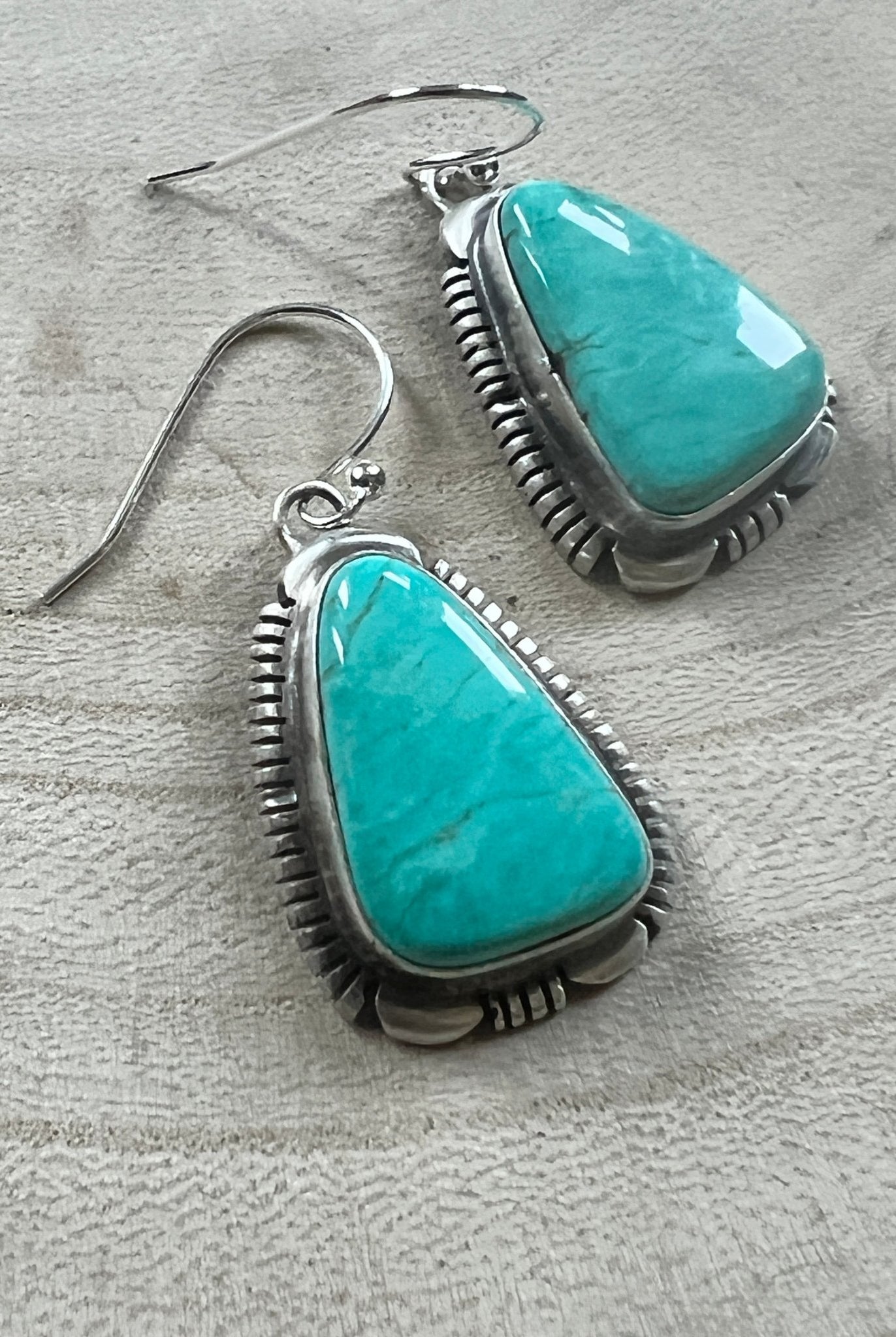 Thomas Francisco Navajo Sterling Silver Earrings with Tyrone Turquoise — 1 5/8" × 3/4" (Hallmarked) - Cowhide and Conchos