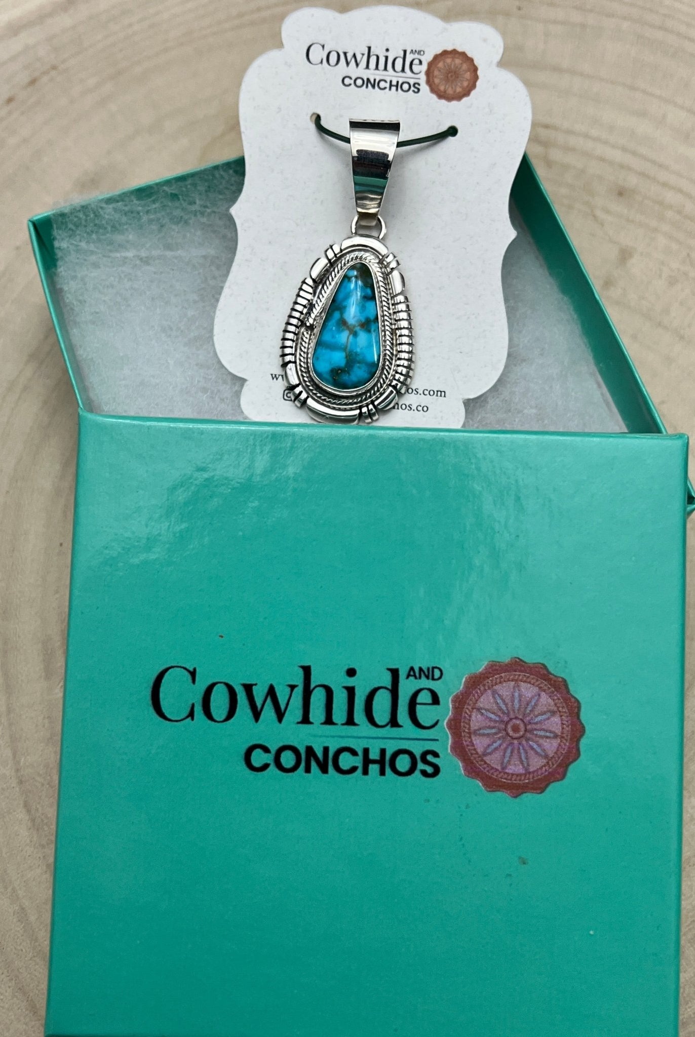 Thomas Francisco Navajo Sterling Silver Pendant with Kingman Turquoise — 2" × 7/8" (Hallmark) - Cowhide and Conchos