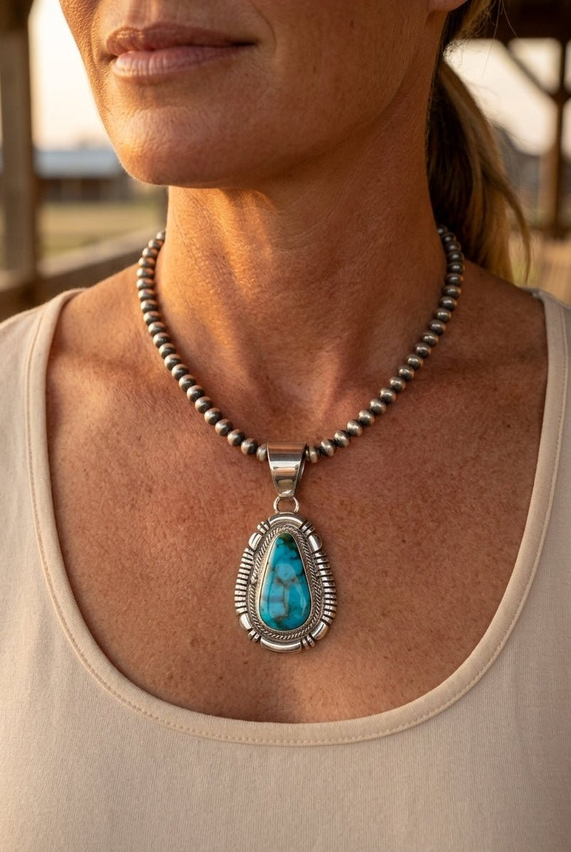 Thomas Francisco Navajo Sterling Silver Pendant with Kingman Turquoise — 2" × 7/8" (Hallmark) - Cowhide and Conchos