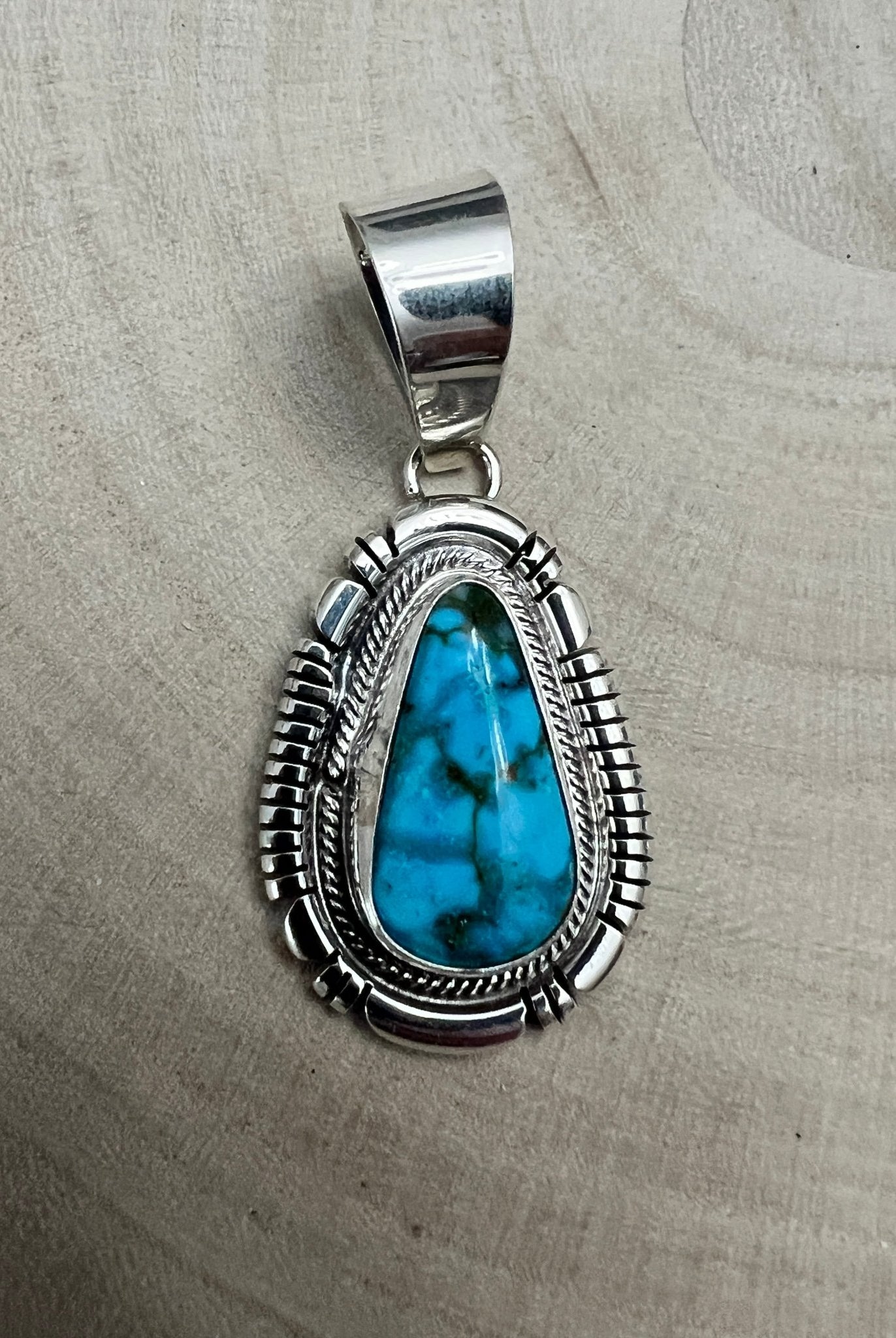 Thomas Francisco Navajo Sterling Silver Pendant with Kingman Turquoise — 2" × 7/8" (Hallmark) - Cowhide and Conchos