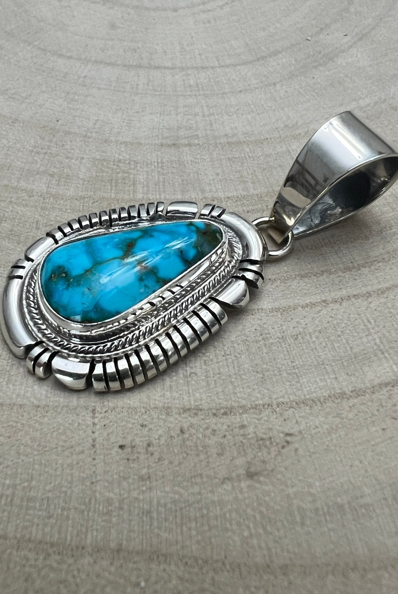 Thomas Francisco Navajo Sterling Silver Pendant with Kingman Turquoise — 2" × 7/8" (Hallmark) - Cowhide and Conchos