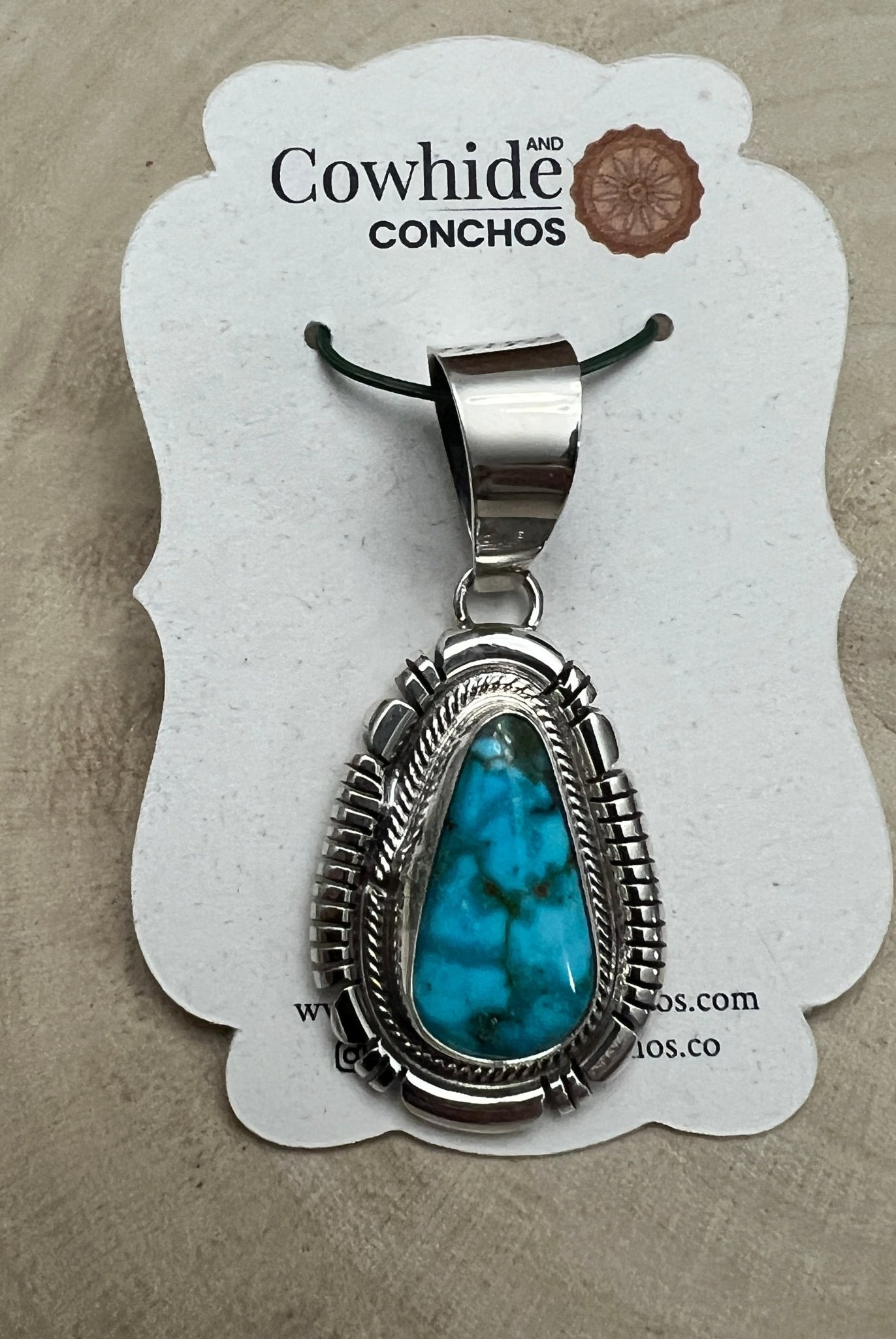 Thomas Francisco Navajo Sterling Silver Pendant with Kingman Turquoise — 2" × 7/8" (Hallmark) - Cowhide and Conchos