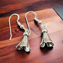 Squash blossom earring - small - Cowhide and Conchos