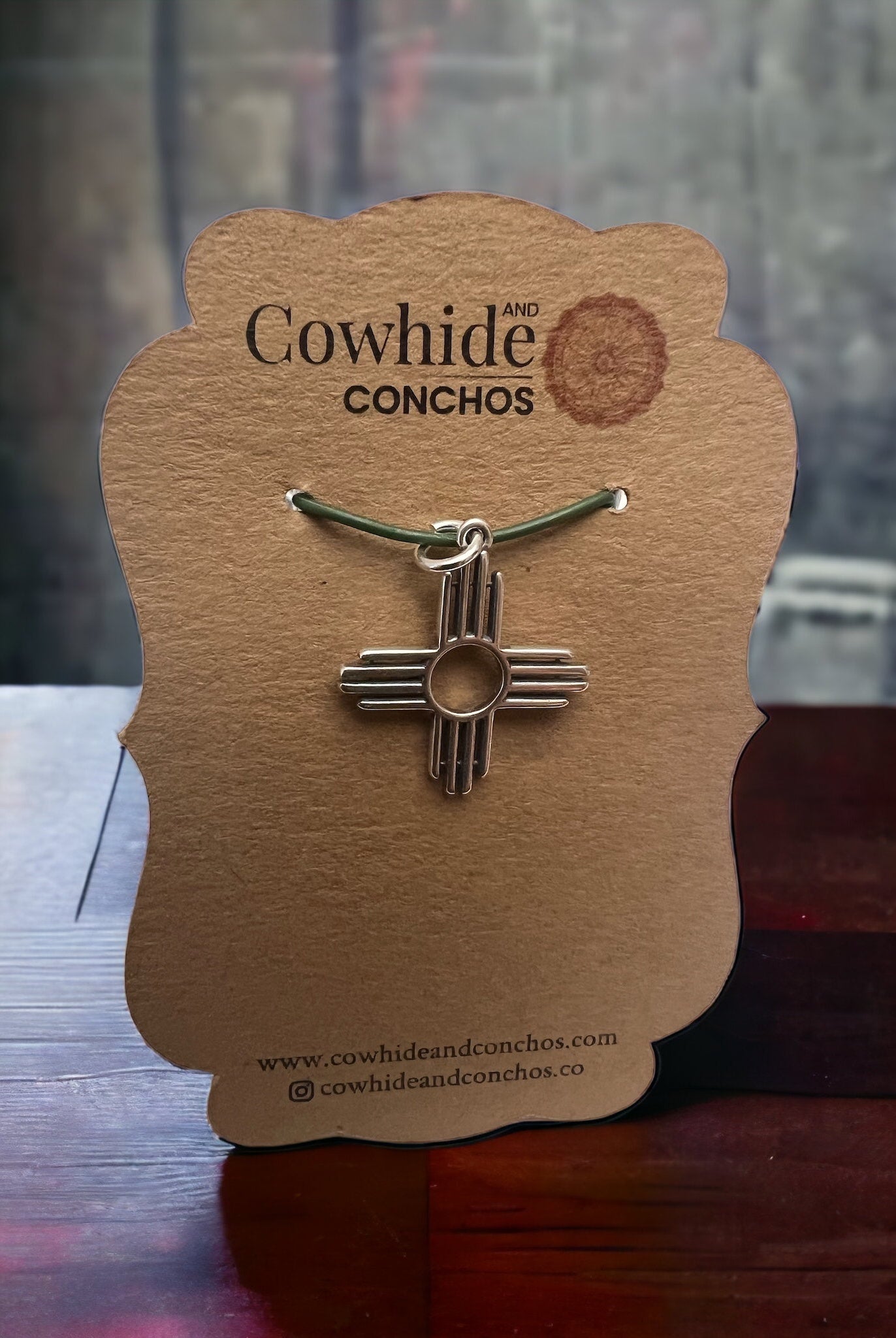 Sterling Zia pendant - Cowhide and Conchos