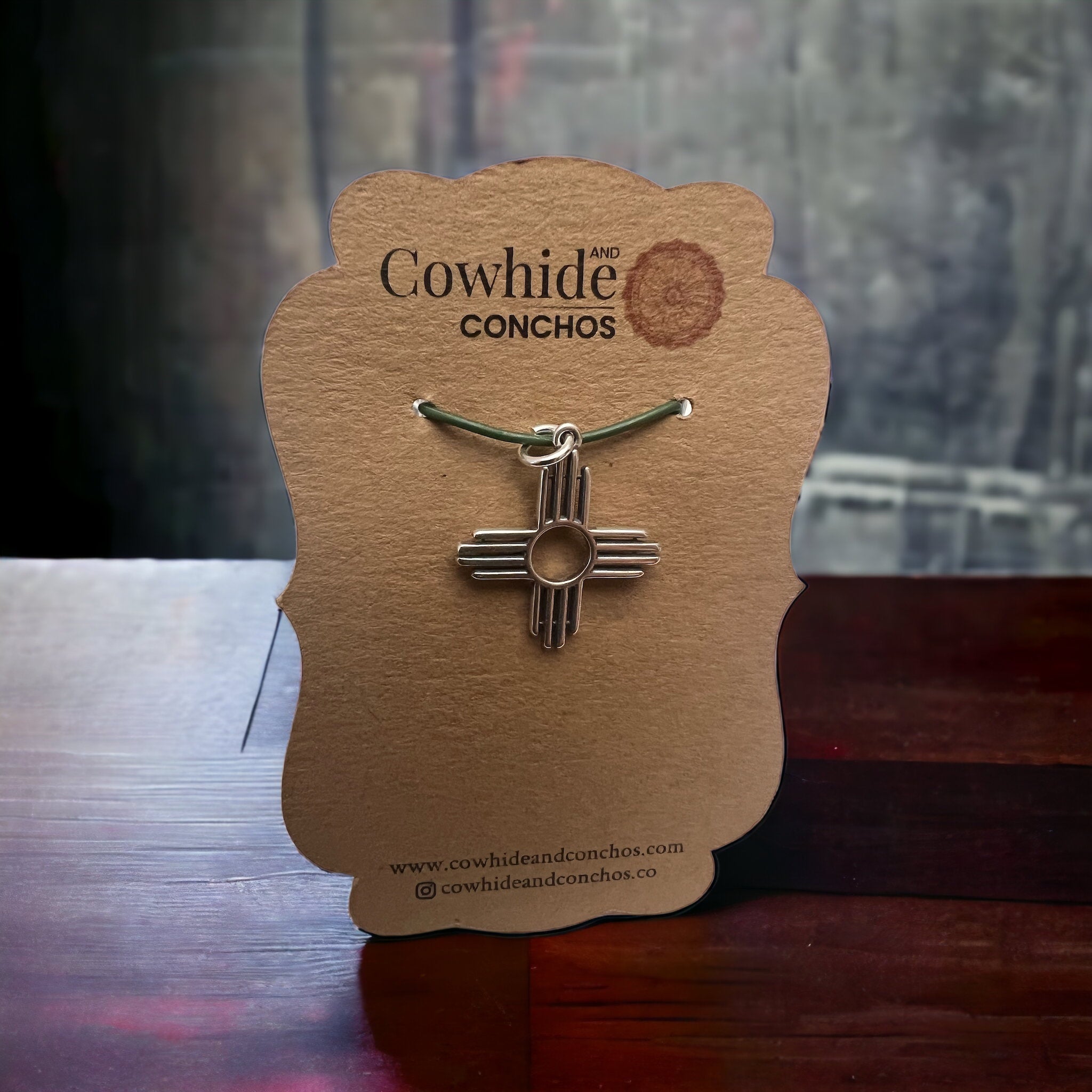 Sterling Zia pendant - Cowhide and Conchos