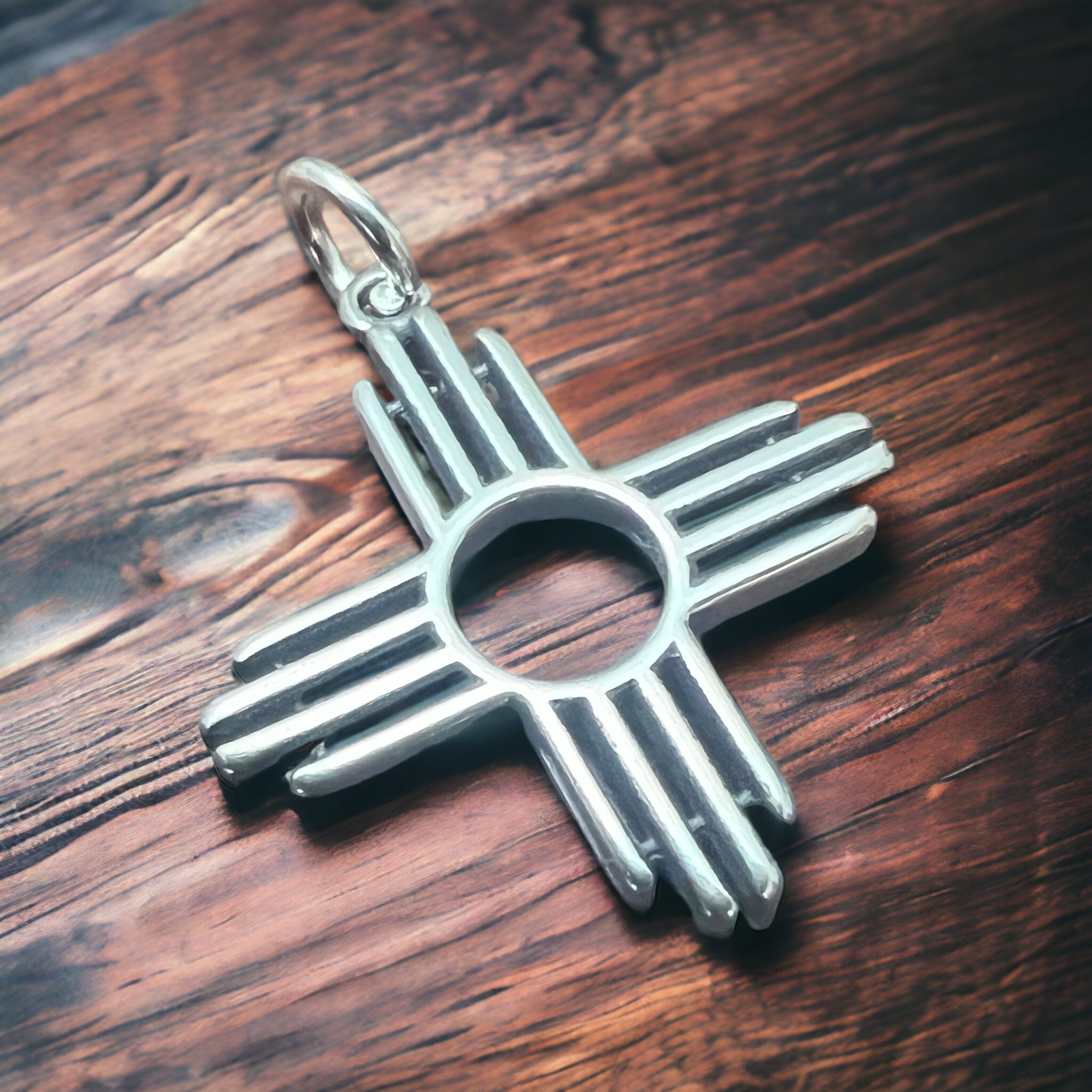 Sterling Zia pendant - Cowhide and Conchos