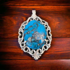 Turquoise pendant - gorgeous turquoise cabochon on cast sterling base - Cowhide and Conchos