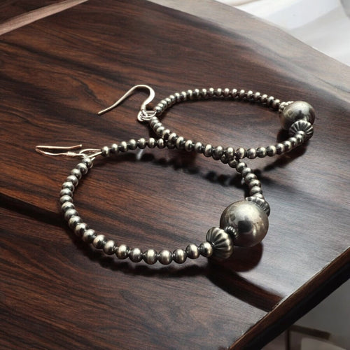 3 mm Sterling Silver Pearl Hoops with 10 mm - 2 inch drop - Cowhide and Conchos