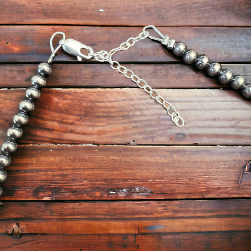 4mm Sterling Pearl choker with pink conch - Cowhide and Conchos