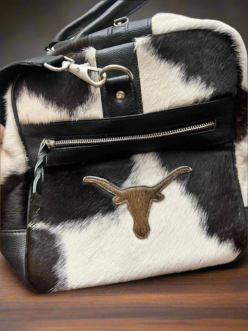Black and White Longhorn Cowhide Duffle Bag - Cowhide and Conchos