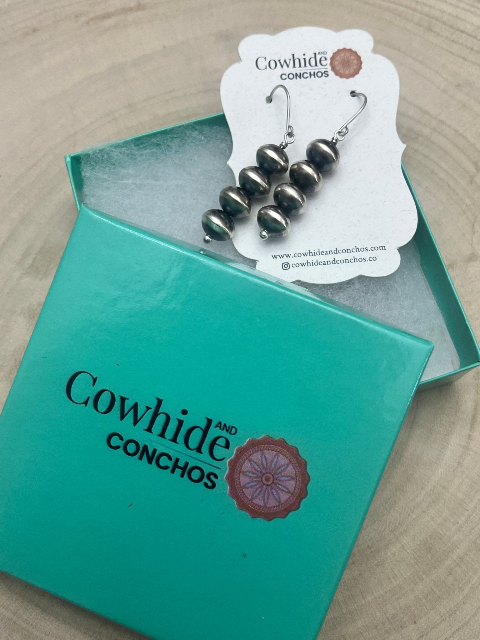 Bryannen Halwood Navajo Pearl Earrings — 2" Sterling Silver (Handcrafted by Navajo Artist) - Cowhide and Conchos