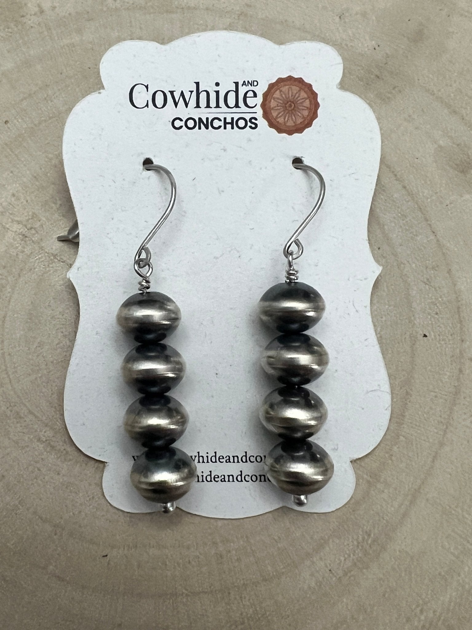 Bryannen Halwood Navajo Pearl Earrings — 2" Sterling Silver (Handcrafted by Navajo Artist) - Cowhide and Conchos